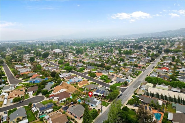 bird's eye view featuring a residential view and a mountain view