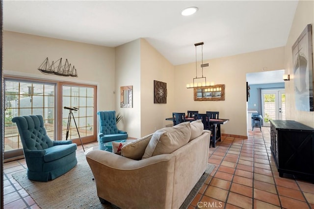 tiled living room featuring french doors, recessed lighting, baseboards, visible vents, and a chandelier
