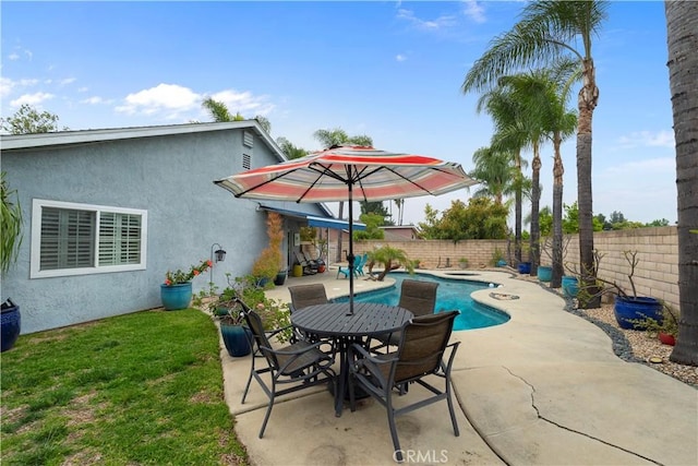 view of patio featuring a fenced in pool and a fenced backyard