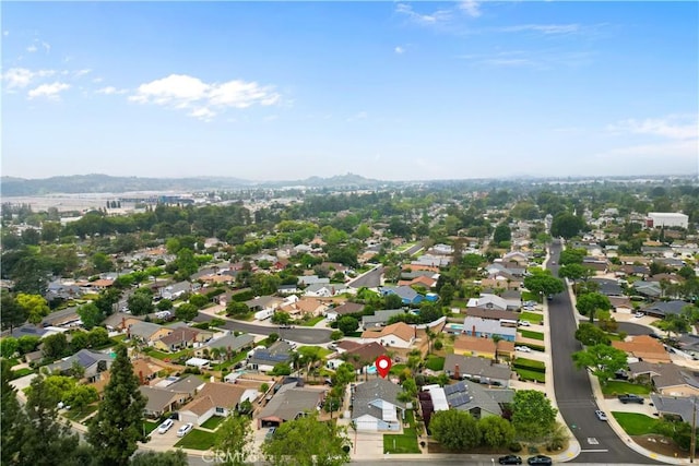 birds eye view of property featuring a mountain view and a residential view