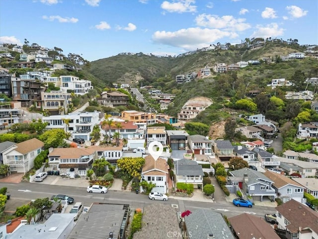 drone / aerial view with a mountain view and a residential view
