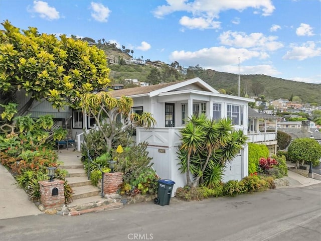 view of front of house with a mountain view