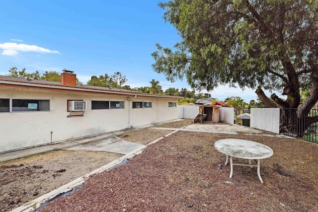 6552 Mallard St, San Diego, CA 92114 - view of yard featuring a wall mounted air conditioner