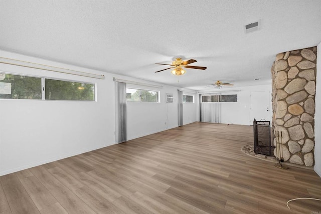 6552 Mallard St, San Diego, CA 92114 - unfurnished living room with a ceiling fan, wood finished floors, and a textured ceiling