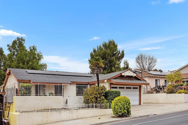 6552 Mallard St, San Diego, CA 92114 - ranch-style house featuring a garage, driveway, solar panels, and stucco siding