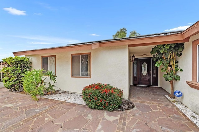 6552 Mallard St, San Diego, CA 92114 - doorway to property featuring stucco siding