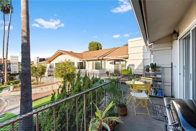 balcony featuring a residential view