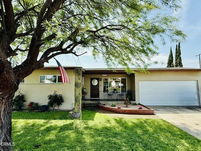 ranch-style house with an attached garage, stucco siding, concrete driveway, a front lawn, and a porch