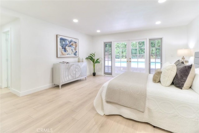 bedroom featuring access to exterior, light wood-type flooring, french doors, baseboards, and recessed lighting