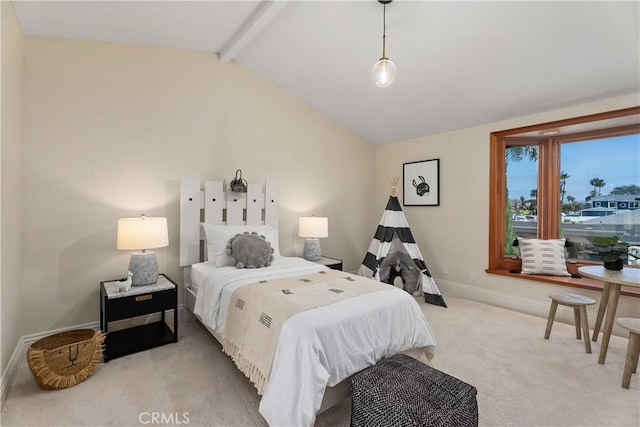 bedroom with lofted ceiling with beams, carpet flooring, and baseboards