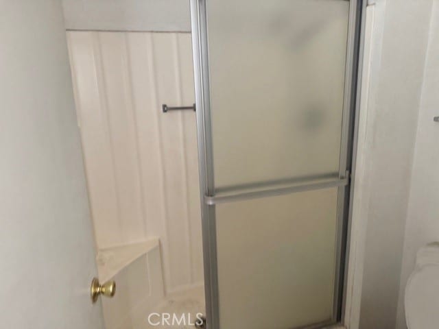 14122 Pawnee Rd, Apple Valley, CA 92307 - bathroom with a stall shower and toilet