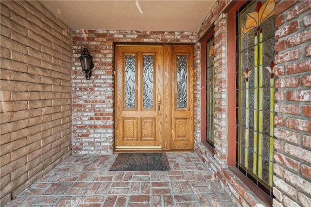 11300 Dulcet Ave, Porter Ranch, CA 91326 - doorway to property with covered porch and brick siding