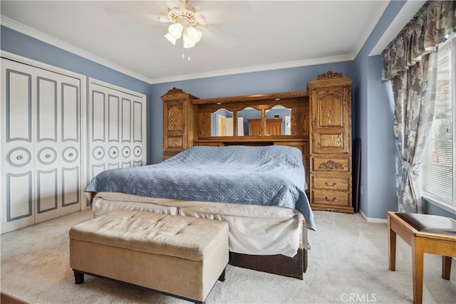 11300 Dulcet Ave, Porter Ranch, CA 91326 - bedroom with light colored carpet, ornamental molding, a ceiling fan, and multiple closets