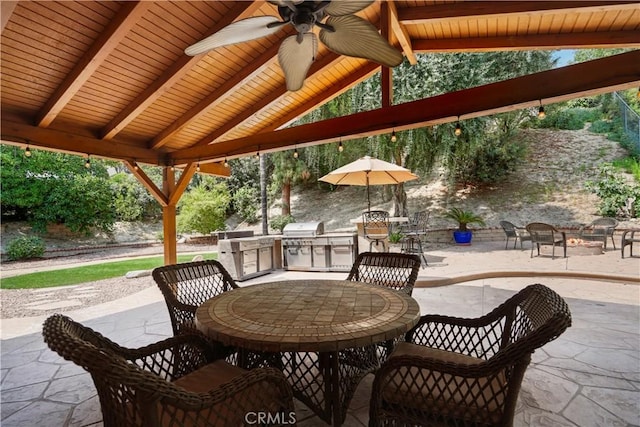11300 Dulcet Ave, Porter Ranch, CA 91326 - view of patio / terrace featuring an outdoor kitchen, outdoor dining area, ceiling fan, and a gazebo