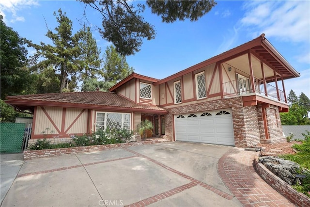 11300 Dulcet Ave, Porter Ranch, CA 91326 - english style home with brick siding, a garage, and driveway