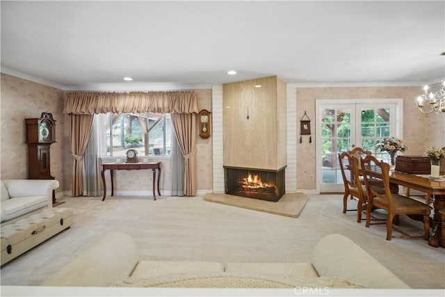 11300 Dulcet Ave, Porter Ranch, CA 91326 - carpeted living room featuring crown molding, a fireplace, a chandelier, wallpapered walls, and recessed lighting