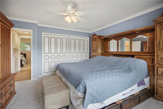 11300 Dulcet Ave, Porter Ranch, CA 91326 - bedroom with multiple closets, crown molding, carpet flooring, and ceiling fan