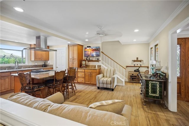 11300 Dulcet Ave, Porter Ranch, CA 91326 - living room with recessed lighting, light wood-style flooring, stairway, ornamental molding, and a ceiling fan