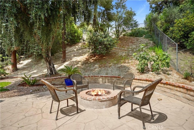 11300 Dulcet Ave, Porter Ranch, CA 91326 - view of patio featuring a fire pit