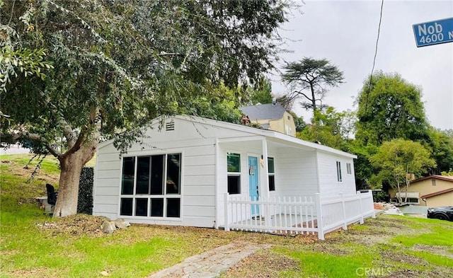 view of front of home with fence