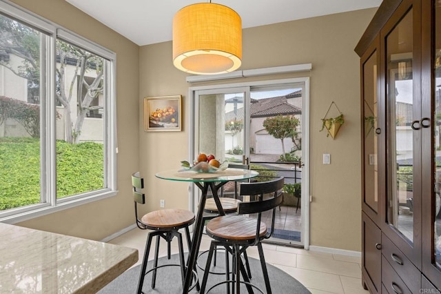3358 Caminito Luna Nueva, Del Mar, CA 92014 - dining space with plenty of natural light, baseboards, and light tile patterned flooring