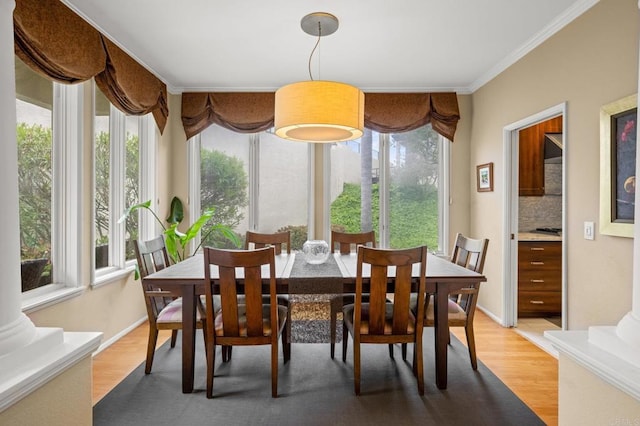 3358 Caminito Luna Nueva, Del Mar, CA 92014 - dining room with light wood-style floors and crown molding