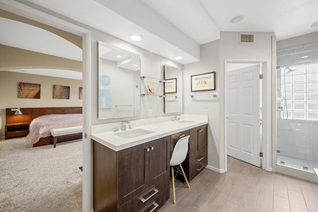 3358 Caminito Luna Nueva, Del Mar, CA 92014 - ensuite bathroom featuring a shower stall, double vanity, recessed lighting, wood finished floors, and baseboards