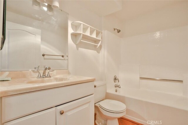 7100 La Tijera Blvd Unit B202, Los Angeles, CA 90045 - bathroom featuring toilet, vanity, and tub / shower combination