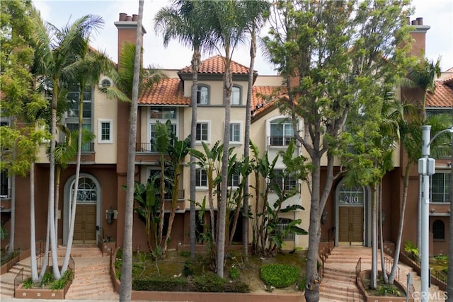 7100 La Tijera Blvd Unit B202, Los Angeles, CA 90045 - view of front of home with a tiled roof and stucco siding