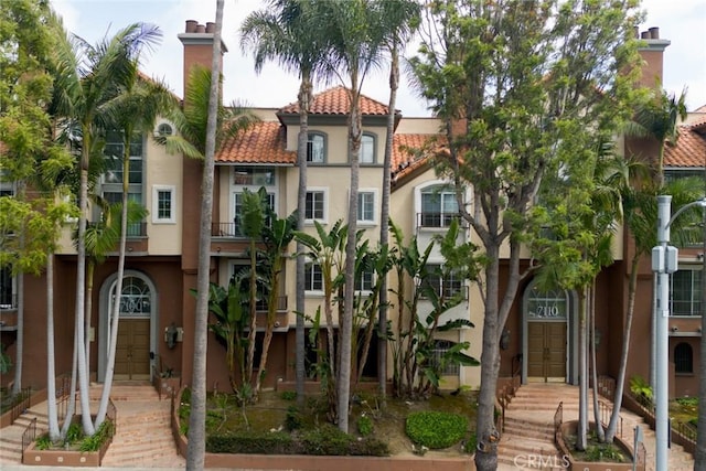 7100 La Tijera Blvd Unit B202, Los Angeles, CA 90045 - view of front of house with stucco siding and a tiled roof
