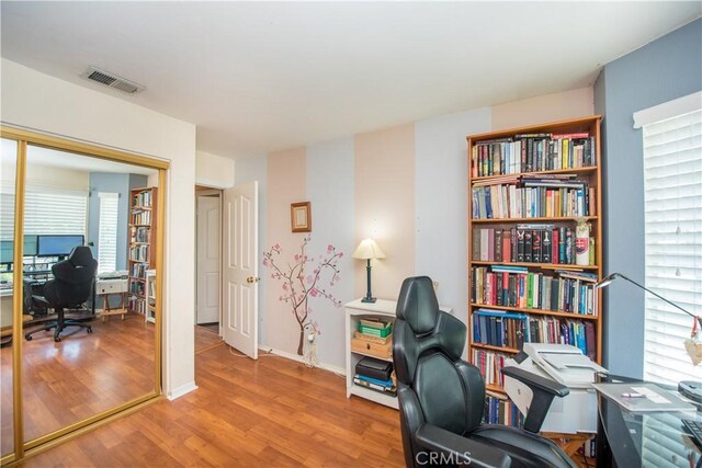 3251 Mountainside Dr, Corona, CA 92882 - home office with wood finished floors and baseboards