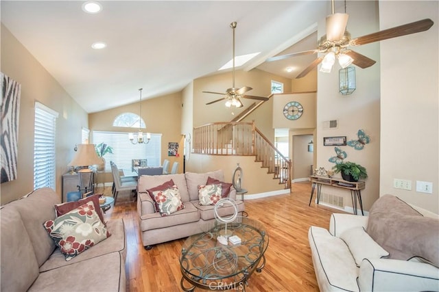 3251 Mountainside Dr, Corona, CA 92882 - living area featuring stairs, wood finished floors, a ceiling fan, a chandelier, and baseboards