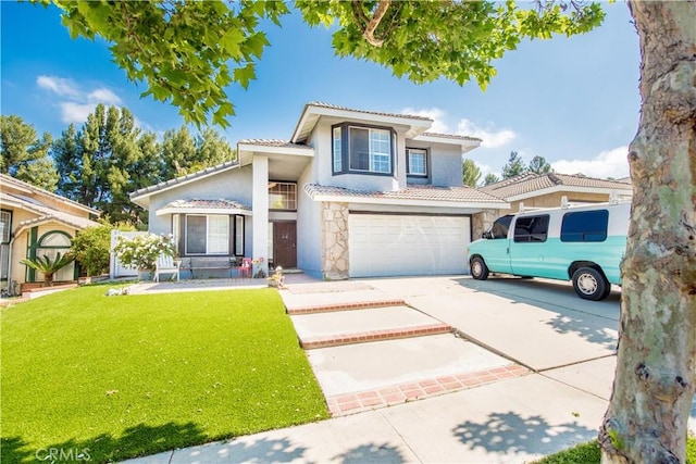 3251 Mountainside Dr, Corona, CA 92882 - mediterranean / spanish home featuring a tiled roof, stone siding, a front lawn, concrete driveway, and an attached garage