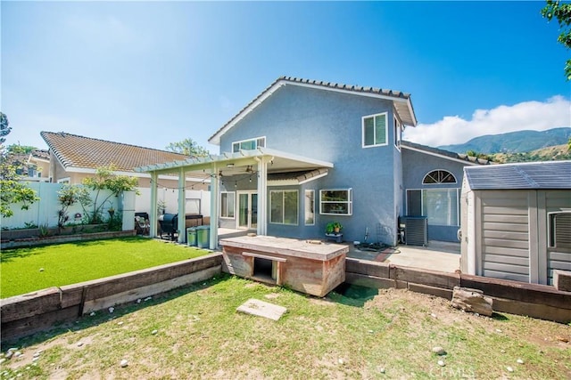 3251 Mountainside Dr, Corona, CA 92882 - back of house with stucco siding, a pergola, a patio, and a mountain view