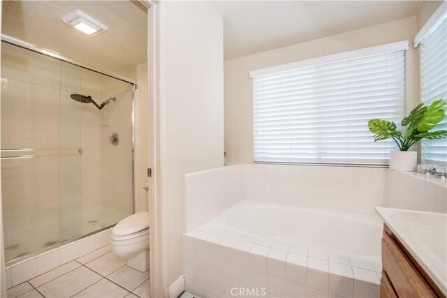 3251 Mountainside Dr, Corona, CA 92882 - full bathroom featuring a shower stall, a garden tub, toilet, vanity, and tile patterned flooring