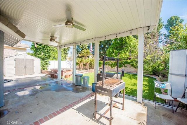 3251 Mountainside Dr, Corona, CA 92882 - view of patio with a storage shed, a ceiling fan, and an outbuilding