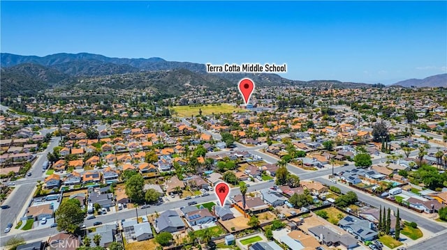 bird's eye view with a mountain view and a residential view