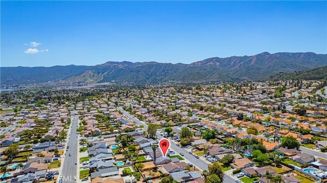 drone / aerial view with a mountain view and a residential view