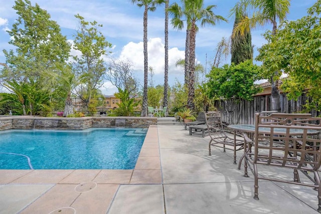 view of pool with a patio area and a fenced in pool