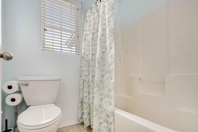 full bath with toilet, baseboards, shower / bathtub combination with curtain, and tile patterned floors