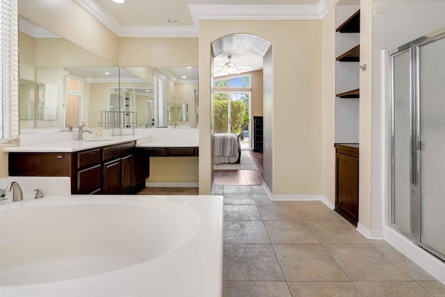 full bathroom featuring crown molding, tile patterned flooring, a shower stall, a ceiling fan, and a bath