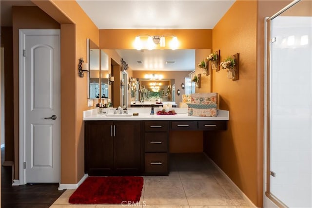 36696 Pavic Ct, Lake Elsinore, CA 92532 - full bathroom with a shower with shower door, vanity, and tile patterned flooring