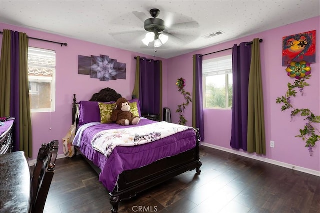 36696 Pavic Ct, Lake Elsinore, CA 92532 - bedroom featuring multiple windows, dark wood-style floors, and a ceiling fan