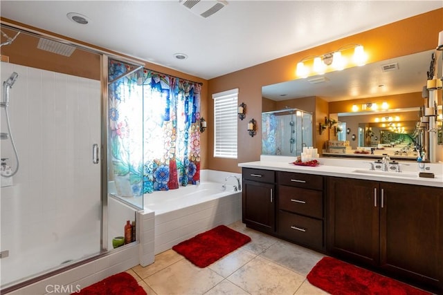 36696 Pavic Ct, Lake Elsinore, CA 92532 - bathroom featuring a stall shower, vanity, a garden tub, and tile patterned floors