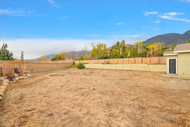 4990 Padre Ave, Rancho Cucamonga, CA 91739 - view of yard with a fenced backyard and a mountain view
