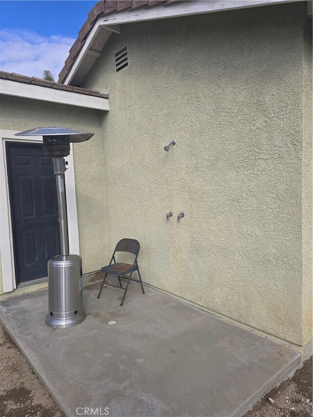 4990 Padre Ave, Rancho Cucamonga, CA 91739 - property entrance featuring stucco siding