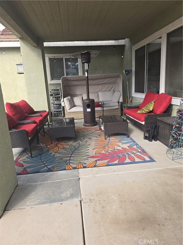 4990 Padre Ave, Rancho Cucamonga, CA 91739 - view of patio / terrace with a hot tub and outdoor lounge area