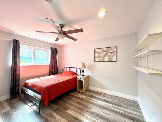 6051 Summerdale Dr, Huntington Beach, CA 92647 - bedroom with ceiling fan, baseboards, and wood finished floors