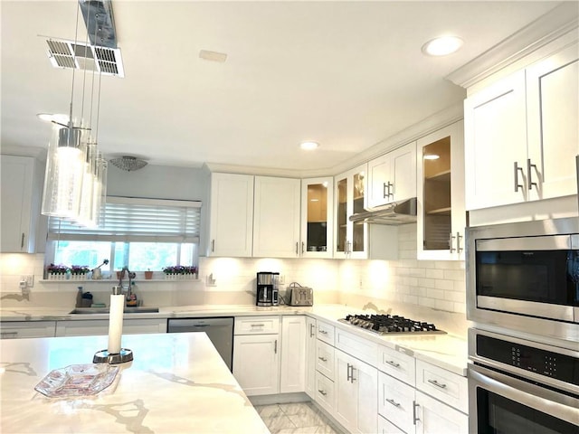 6051 Summerdale Dr, Huntington Beach, CA 92647 - kitchen with a sink, visible vents, light stone countertops, under cabinet range hood, and appliances with stainless steel finishes