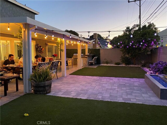 6051 Summerdale Dr, Huntington Beach, CA 92647 - view of yard with a patio area, a fenced backyard, and outdoor dry bar